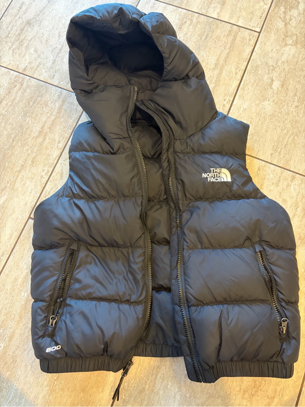 North Face women’s black puffer vest with hood size small